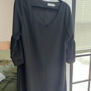 Very cute little black dress! fun sleeves, size XL